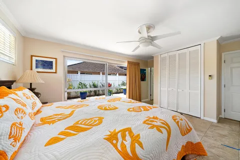 a bed room with a bed and a window