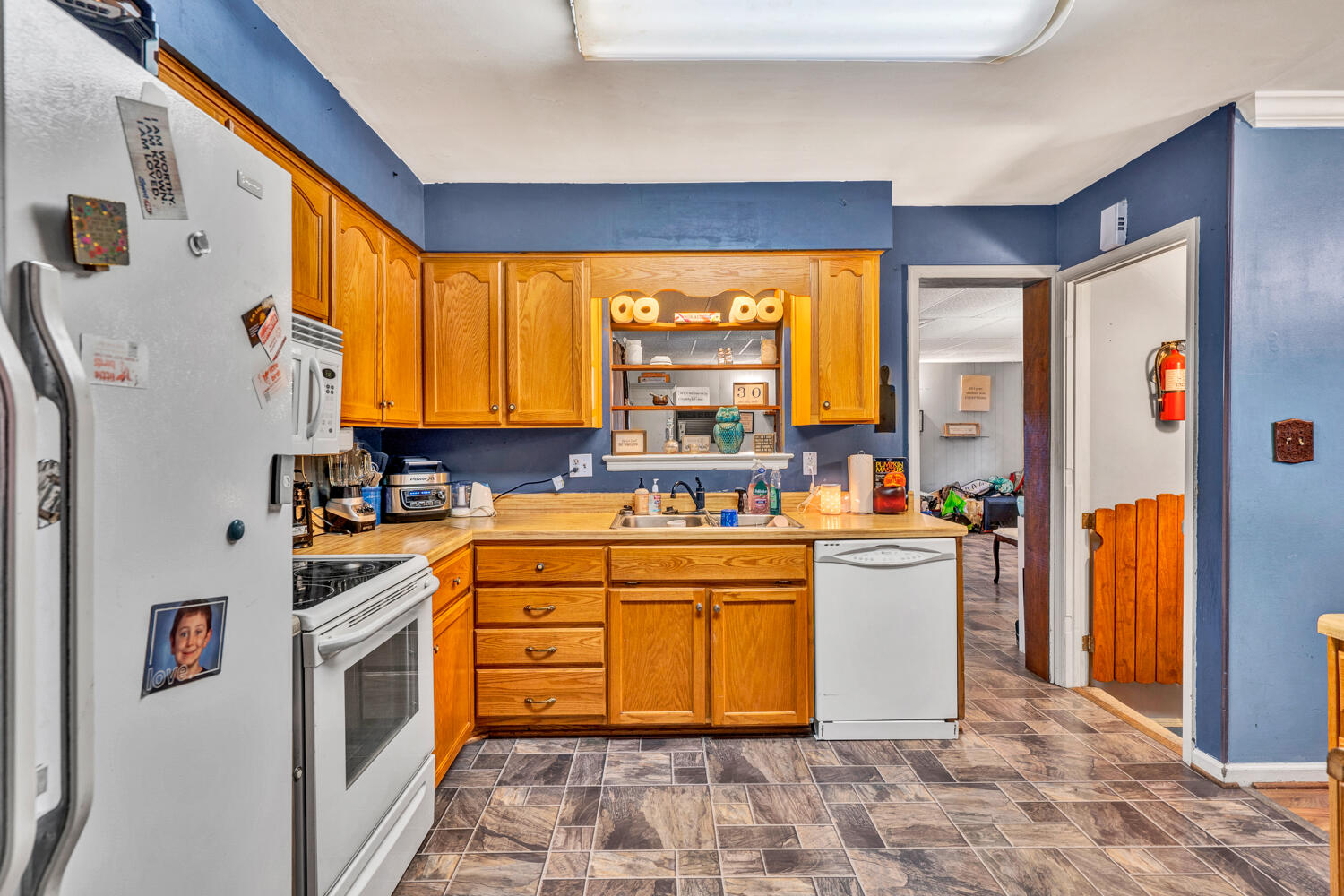 505 Holiday Road Vinton, VA 24179 - Photo 3 of 20 a kitchen with stainless steel appliances granite countertop a stove a refrigerator and a refrigerator