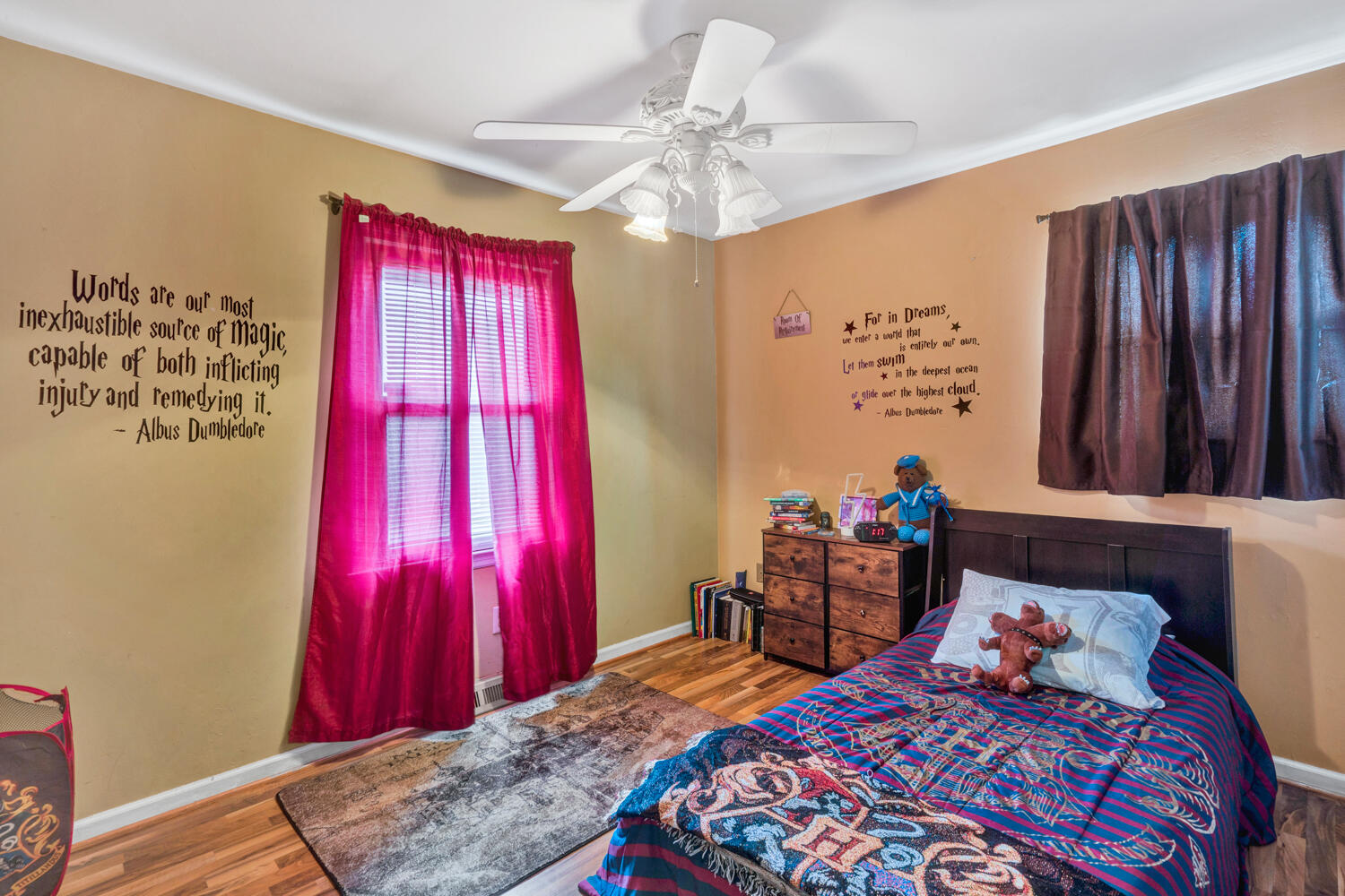 505 Holiday Road Vinton, VA 24179 - Photo 6 of 20 a bedroom with a bed and a chandelier