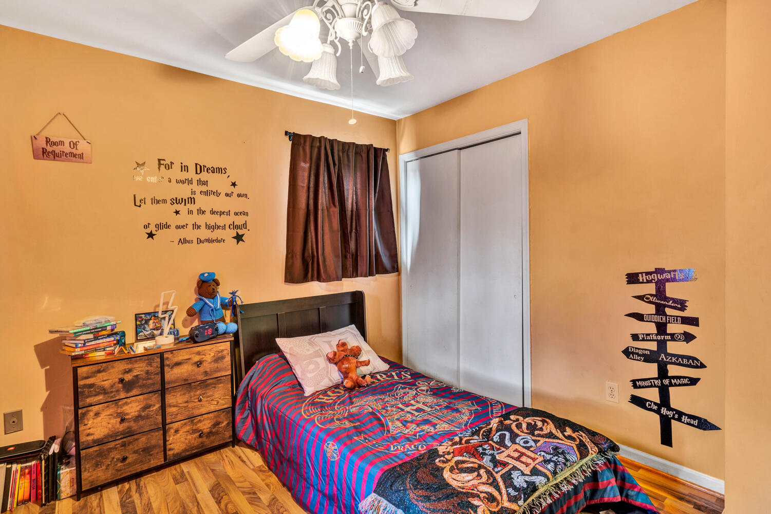 505 Holiday Road Vinton, VA 24179 - Photo 7 of 20 a bedroom with a bed and a chandelier