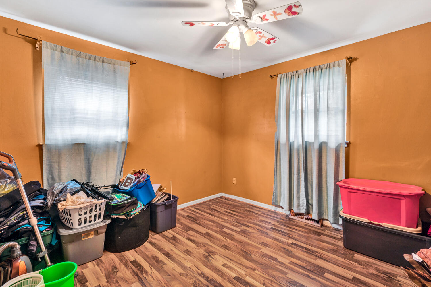505 Holiday Road Vinton, VA 24179 - Photo 8 of 20 a bedroom with bed and a chandelier