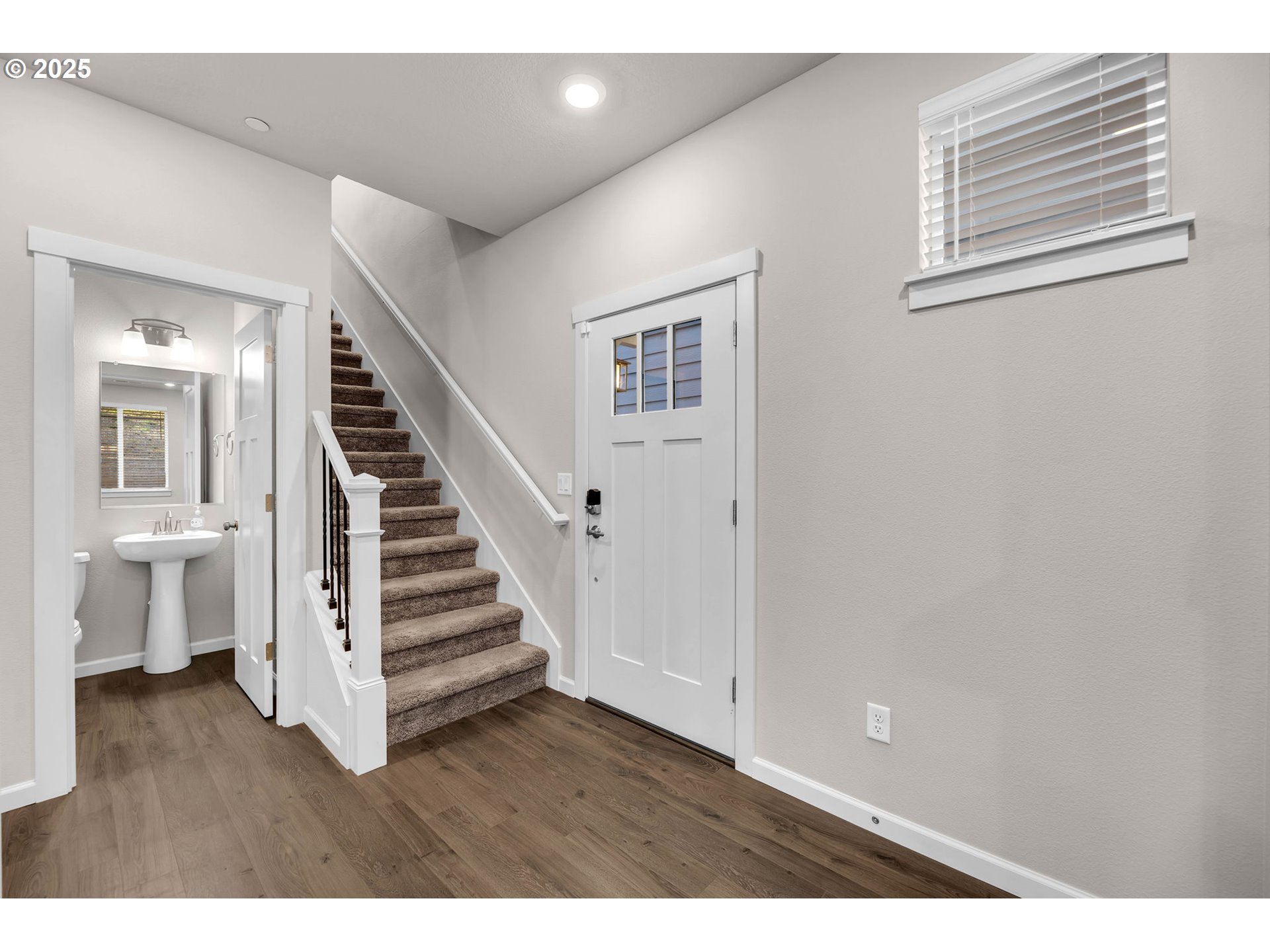 4147 South Canyon View Circle Ridgefield, WA 98642 - Photo 21 of 44 a view of a room with wooden floor and stairs