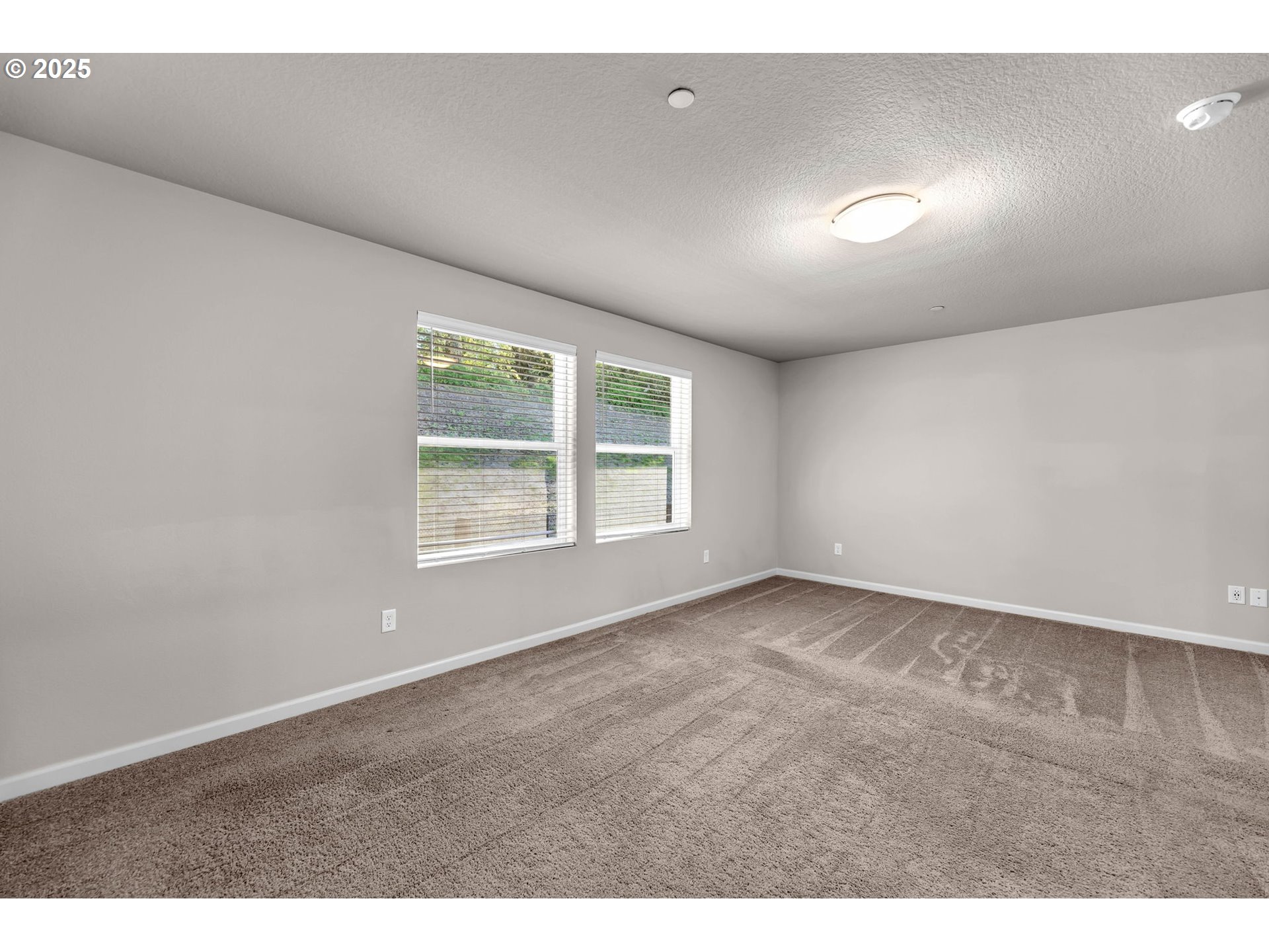 4147 South Canyon View Circle Ridgefield, WA 98642 - Photo 23 of 44 a view of an empty room with a window