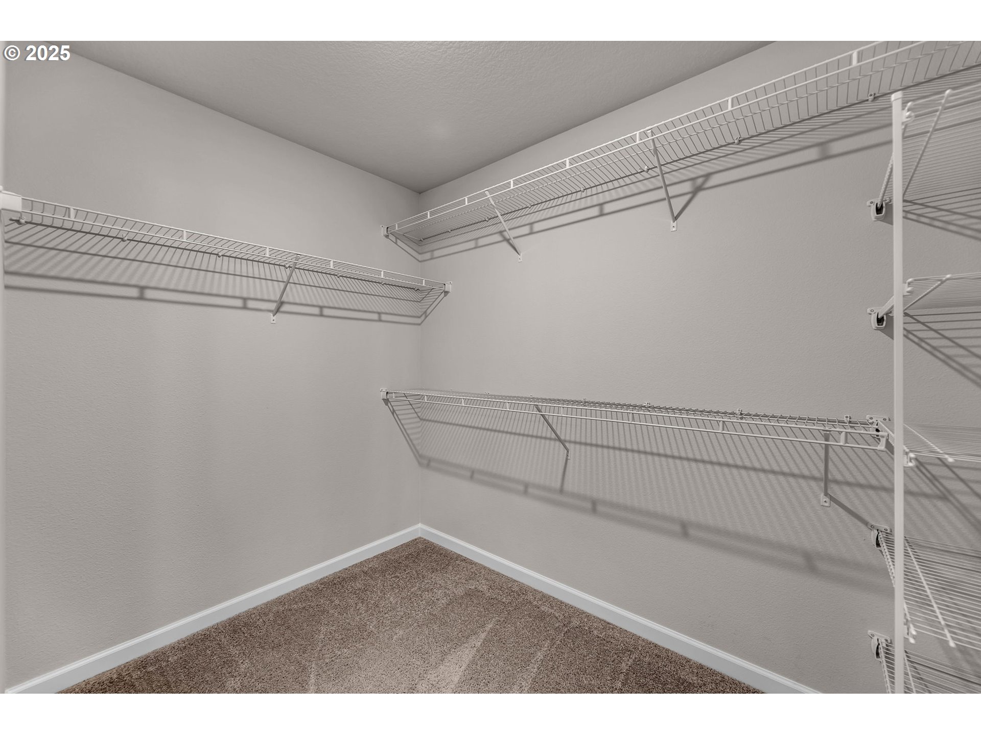 4147 South Canyon View Circle Ridgefield, WA 98642 - Photo 30 of 44 a view of a room with racks on the wall