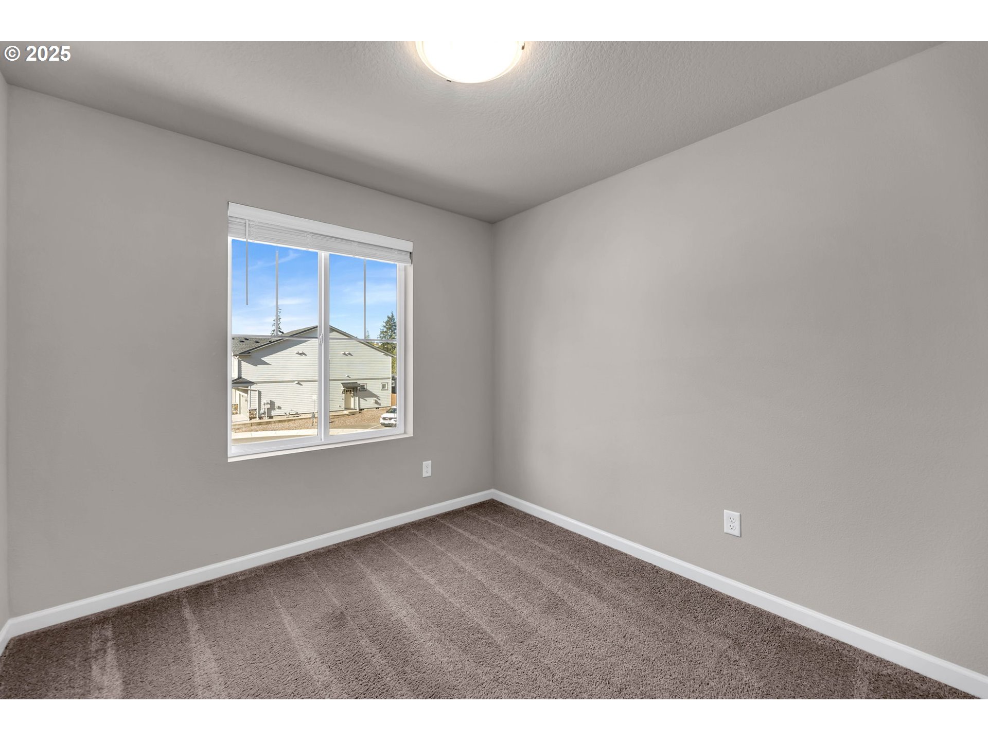 4147 South Canyon View Circle Ridgefield, WA 98642 - Photo 31 of 44 a view of an empty room with a window