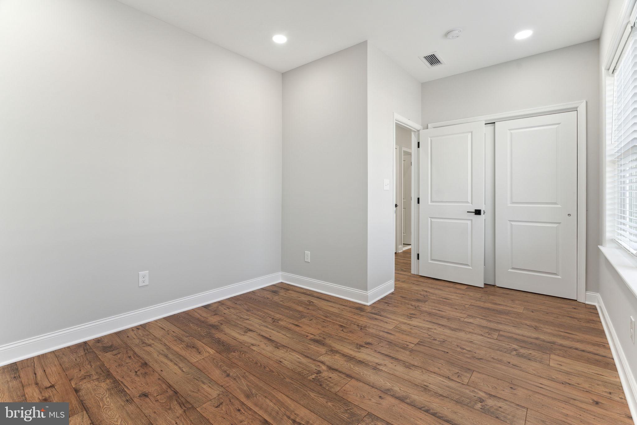 48 Evergreen Lane Phoenixville, PA 19460 - Photo 33 of 42 a view of an empty room with wooden floor
