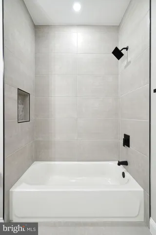 a bathroom with a bathtub