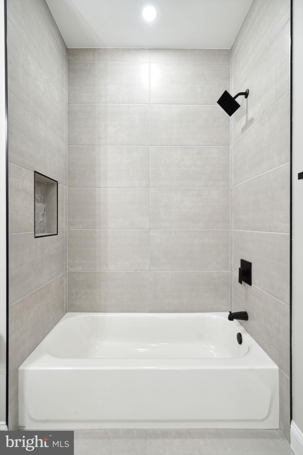 48 Evergreen Lane Phoenixville, PA 19460 - Photo 36 of 42 a bathroom with a bathtub