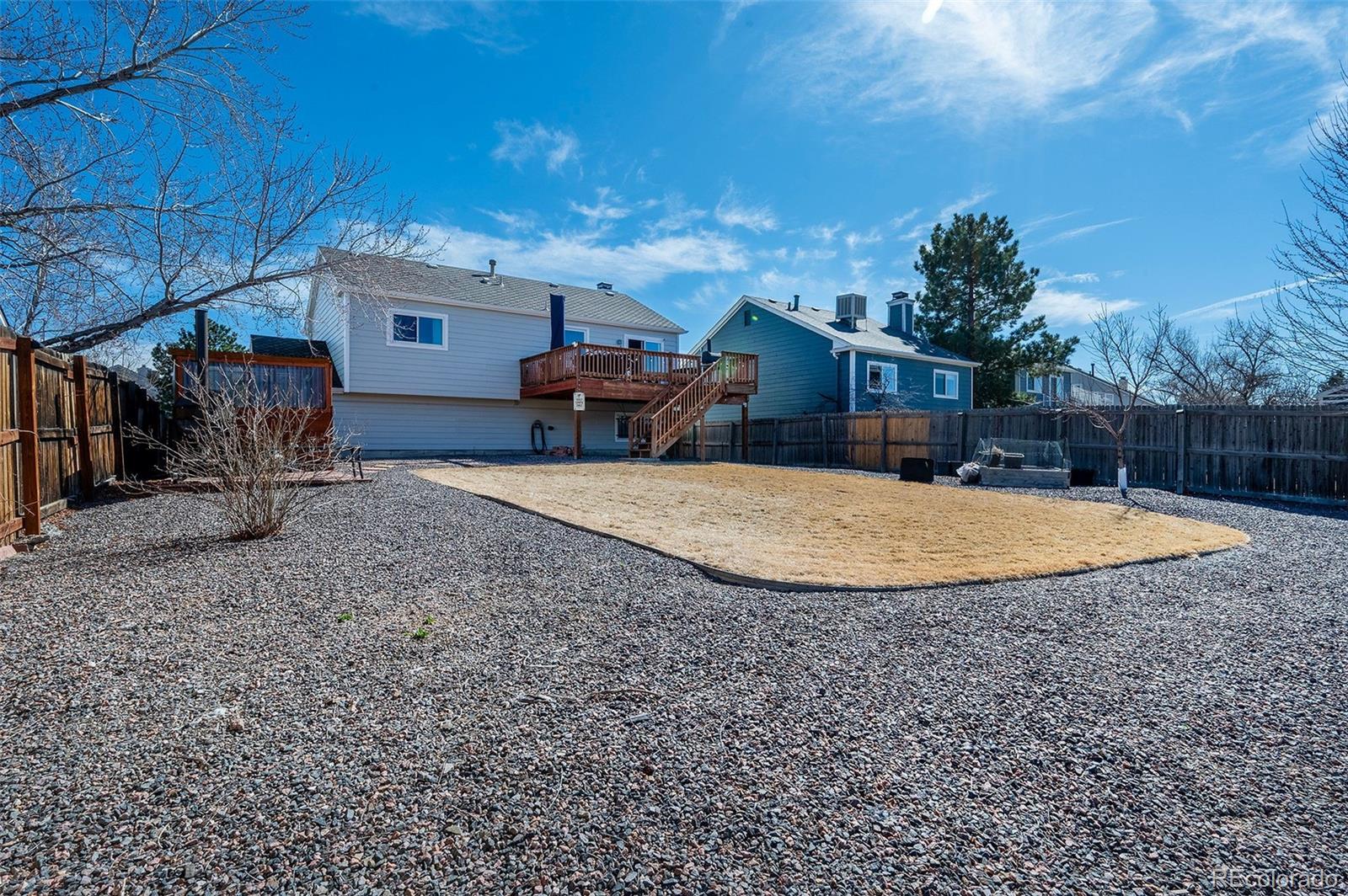 10351 Routt Street Broomfield, CO 80021 - Photo 27 of 31 a view of a house with backyard porch and sitting area