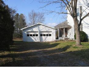 136 Eureka Mill Road Staunton, VA 24401 - Photo 2 of 7 a house with green field in front of it