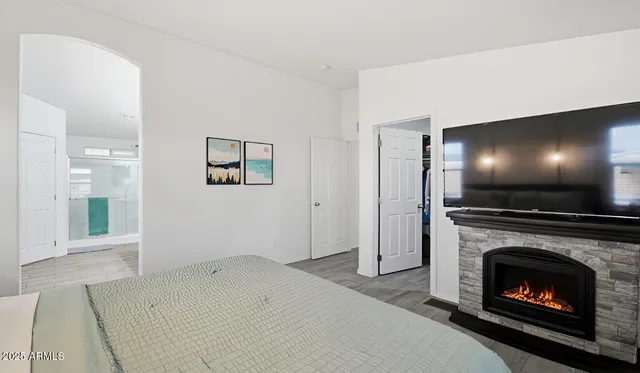 a spacious bathroom with a double vanity sink and a mirror
