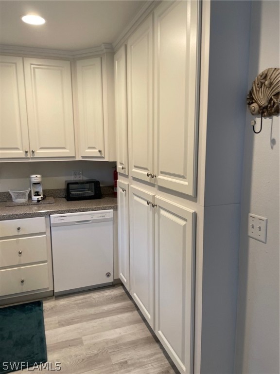 11731 Iona Road Fort Myers, FL 33908 - Photo 18 of 26 a view of kitchen with granite countertop white cabinets and stainless steel appliances