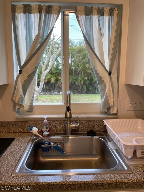 11731 Iona Road Fort Myers, FL 33908 - Photo 19 of 26 a bathroom with a sink and a bathtub