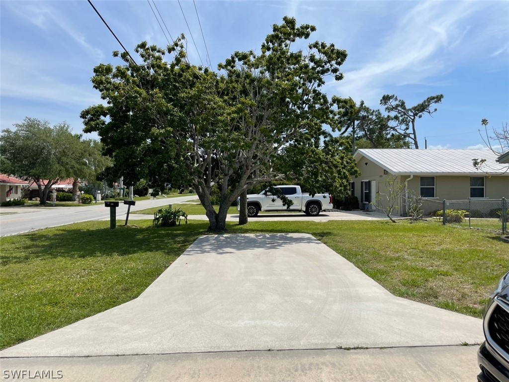 11731 Iona Road Fort Myers, FL 33908 - Photo 20 of 26 a view of a park with large trees