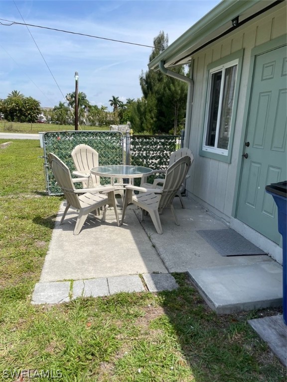 11731 Iona Road Fort Myers, FL 33908 - Photo 21 of 26 a view of a swimming pool with a patio and garden