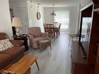 11731 Iona Road Fort Myers, FL 33908 - Photo 4 of 26 a living room with furniture and a table