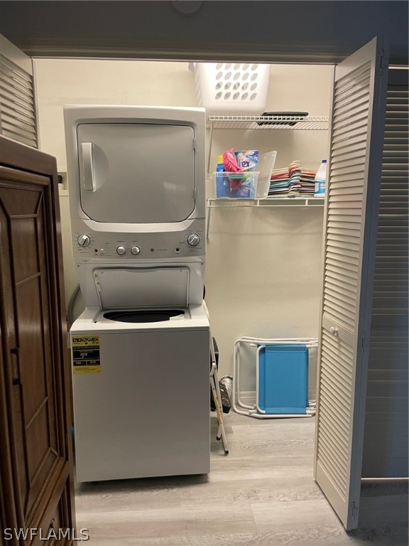 11731 Iona Road Fort Myers, FL 33908 - Photo 9 of 26 a storage room with washer and dryer