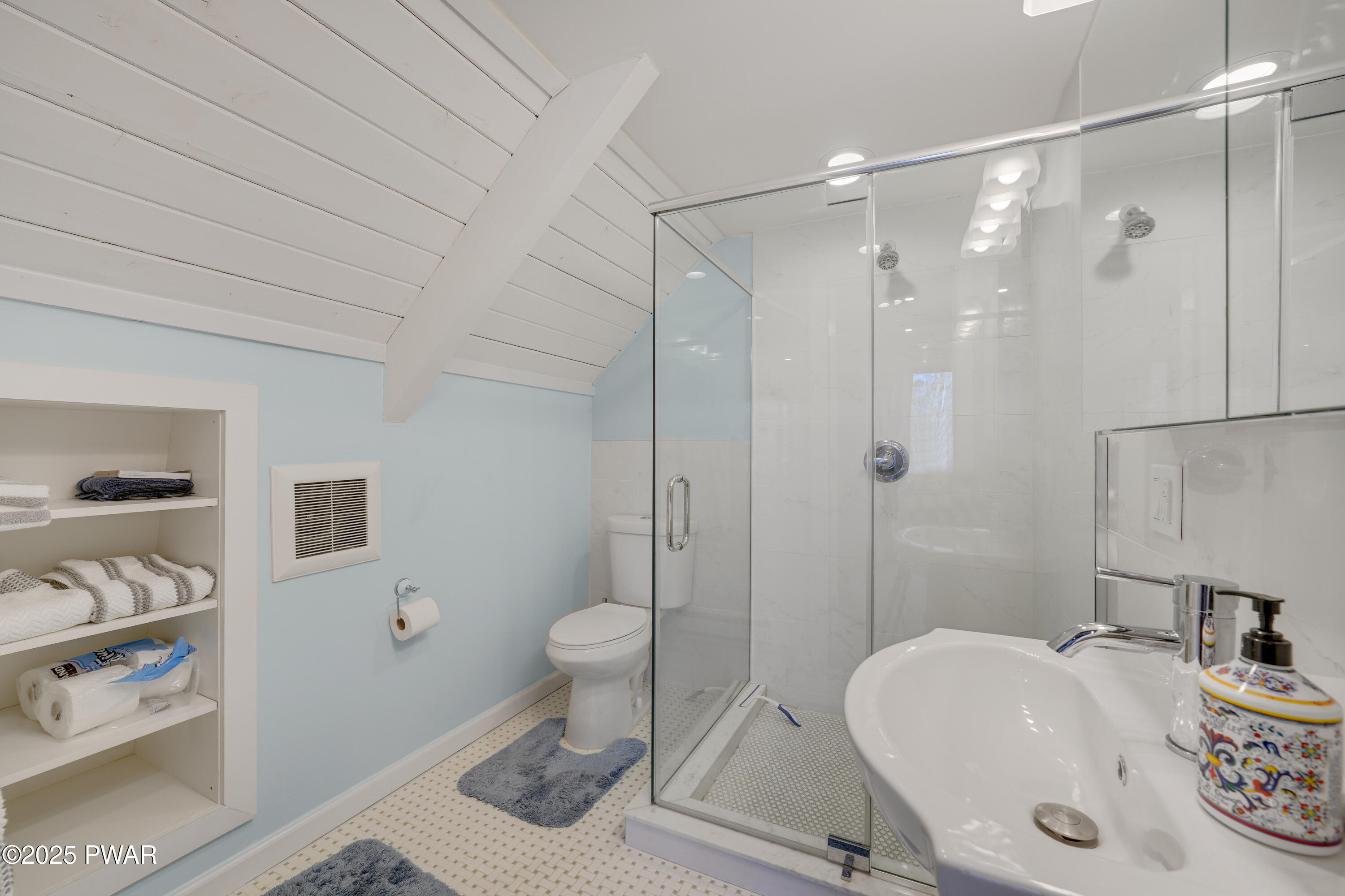 155 Fox Road Dingmans Ferry, PA 18328 - Photo 19 of 25 a bathroom with a sink toilet and shower