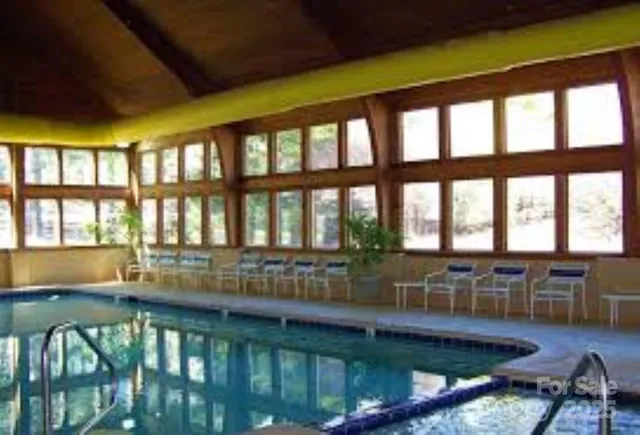 a view of a golf course with a lake