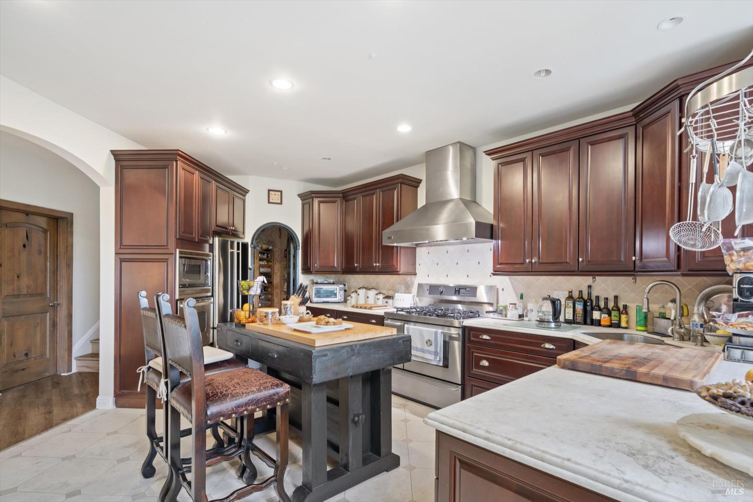 46 Laurel Glen Terrace San Rafael, CA 94903 - Photo 2 of 10 a kitchen with stainless steel appliances granite countertop a sink stove and refrigerator