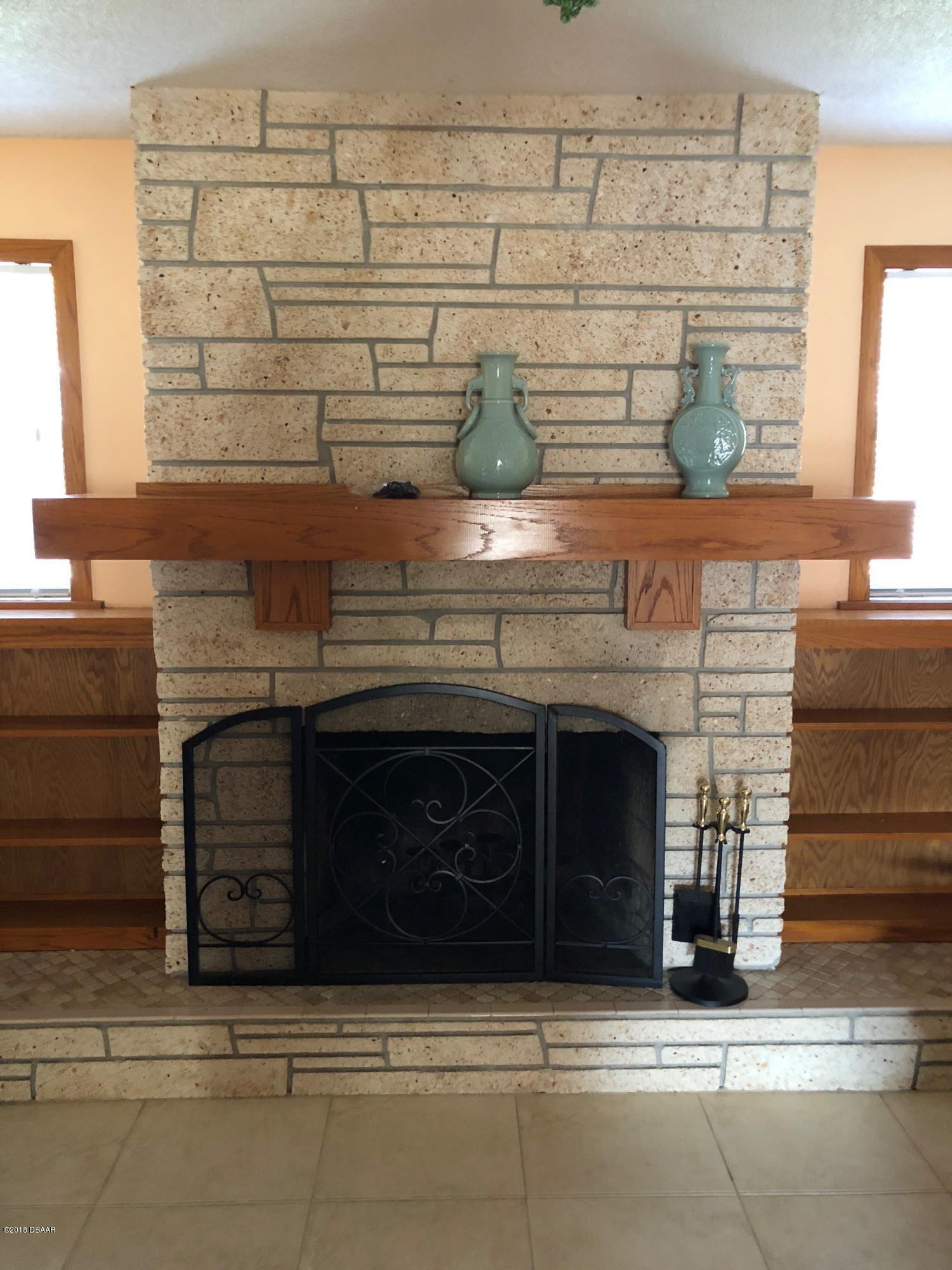 1224 Sunland Road Daytona Beach, FL 32114 - Photo 11 of 27 Fireplace in Family Room