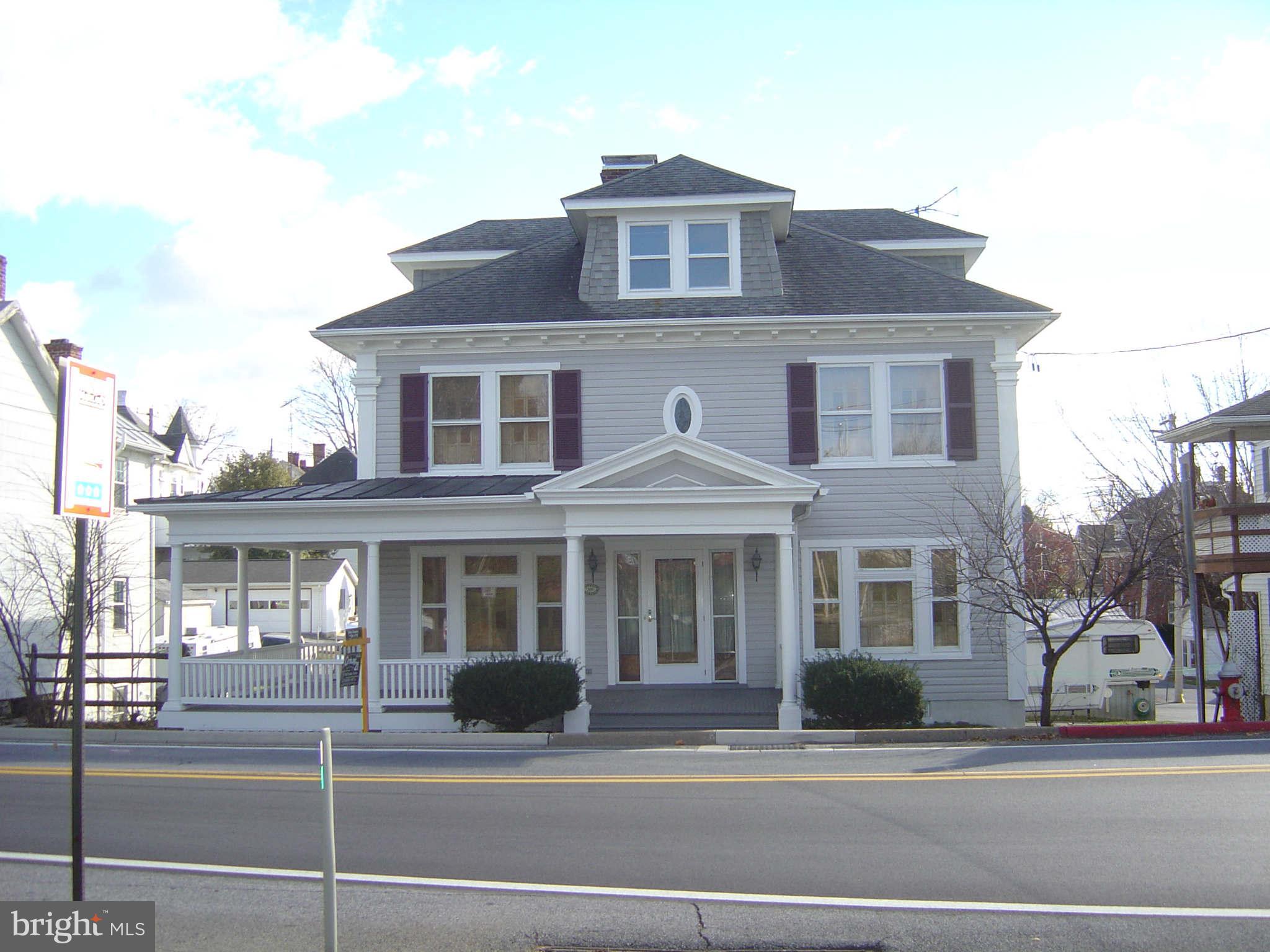 305 Main Street New Windsor, MD 21776 - Photo 1 of 30 a front view of a house