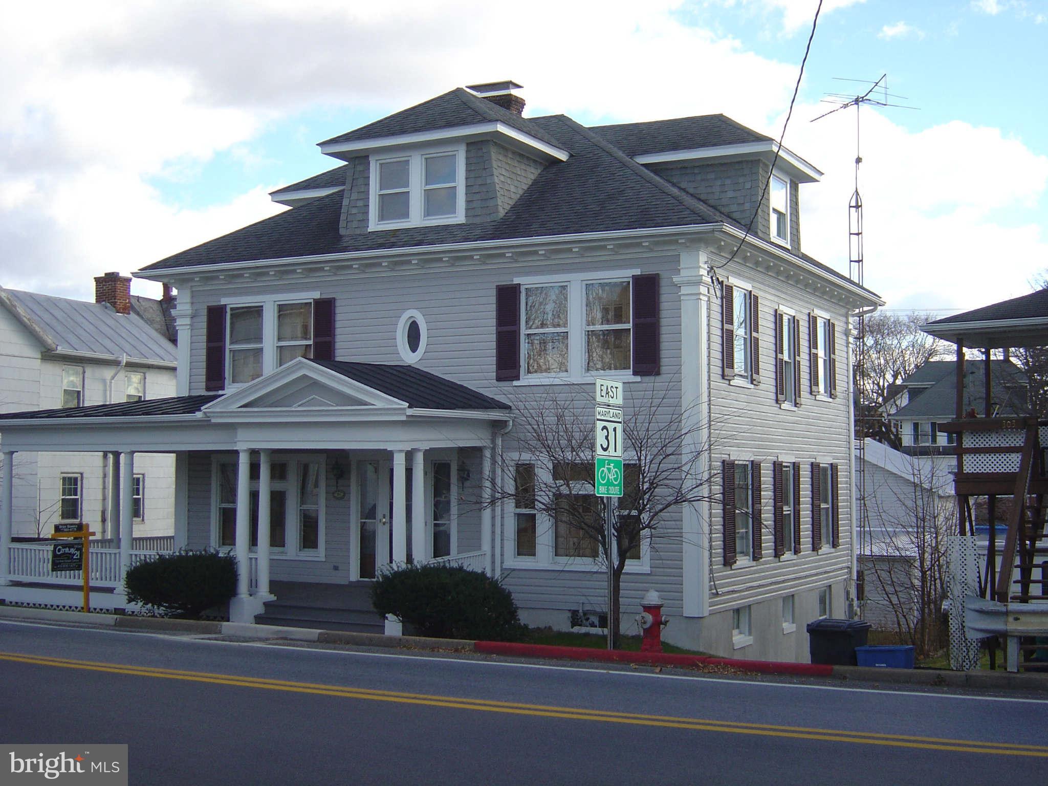 305 Main Street New Windsor, MD 21776 - Photo 2 of 30 a front view of a house