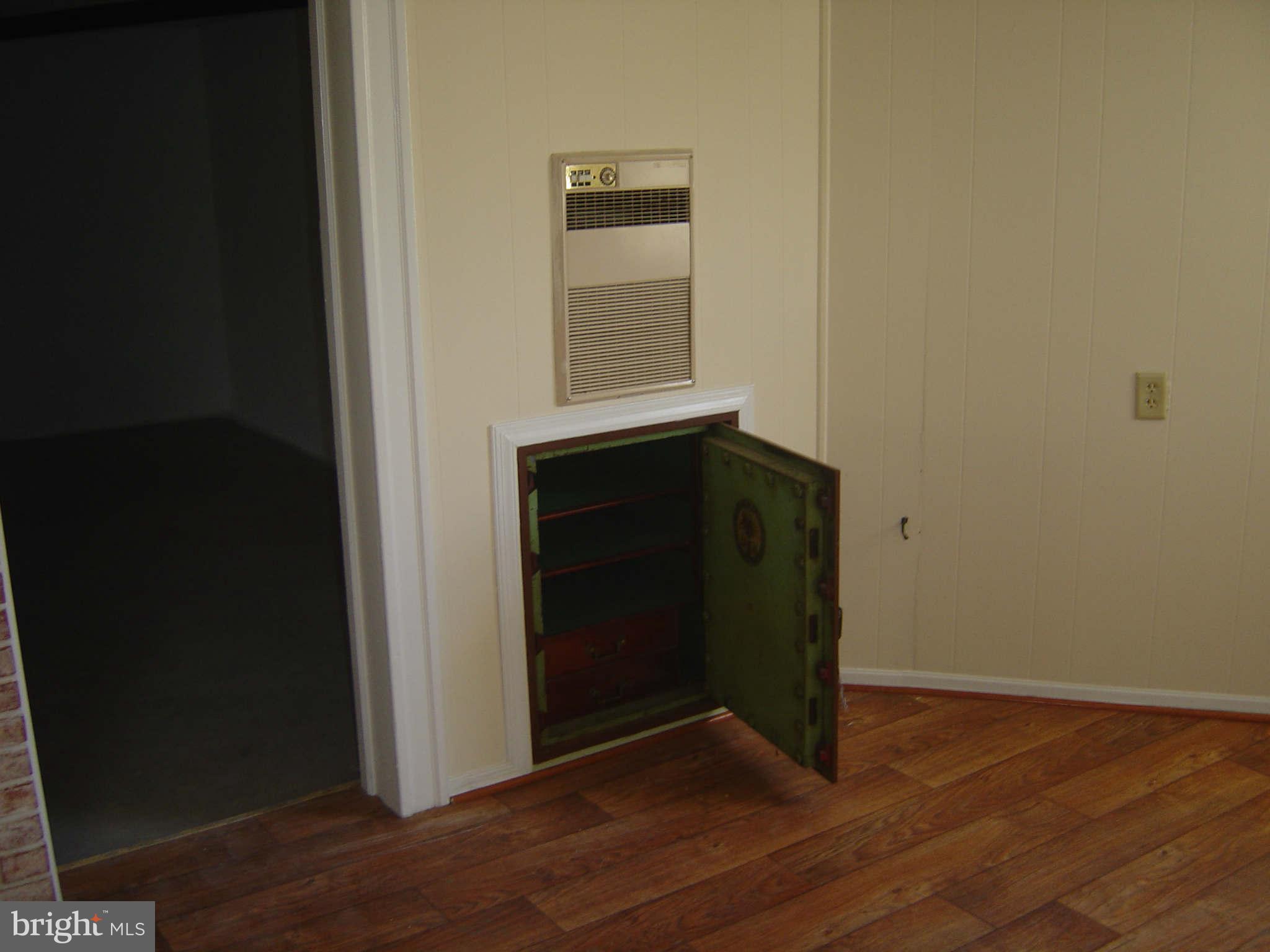 305 Main Street New Windsor, MD 21776 - Photo 25 of 30 a view of an empty room with wooden floor and a window