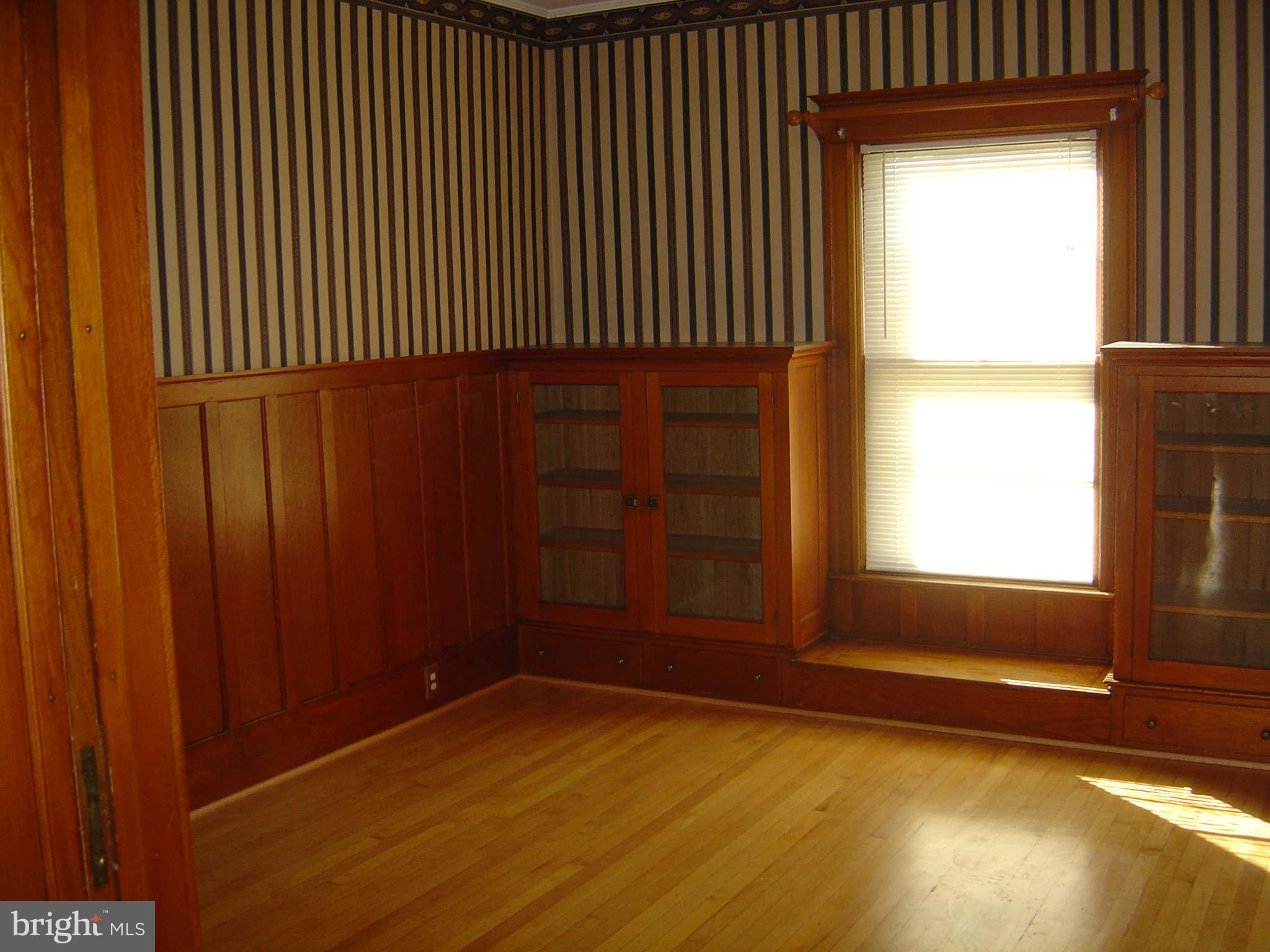 305 Main Street New Windsor, MD 21776 - Photo 10 of 30 an empty room with windows