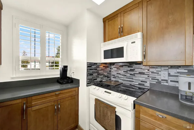 a bedroom with furniture and window