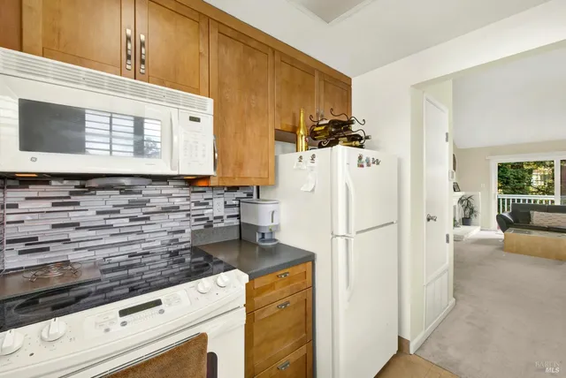a bathroom with a shower and a mirror