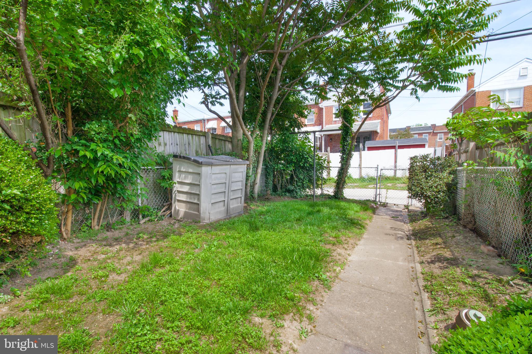 6916 Broening Road Dundalk, MD 21222 - Photo 18 of 21 Fenced backyard w/ shed - poss. parking pad