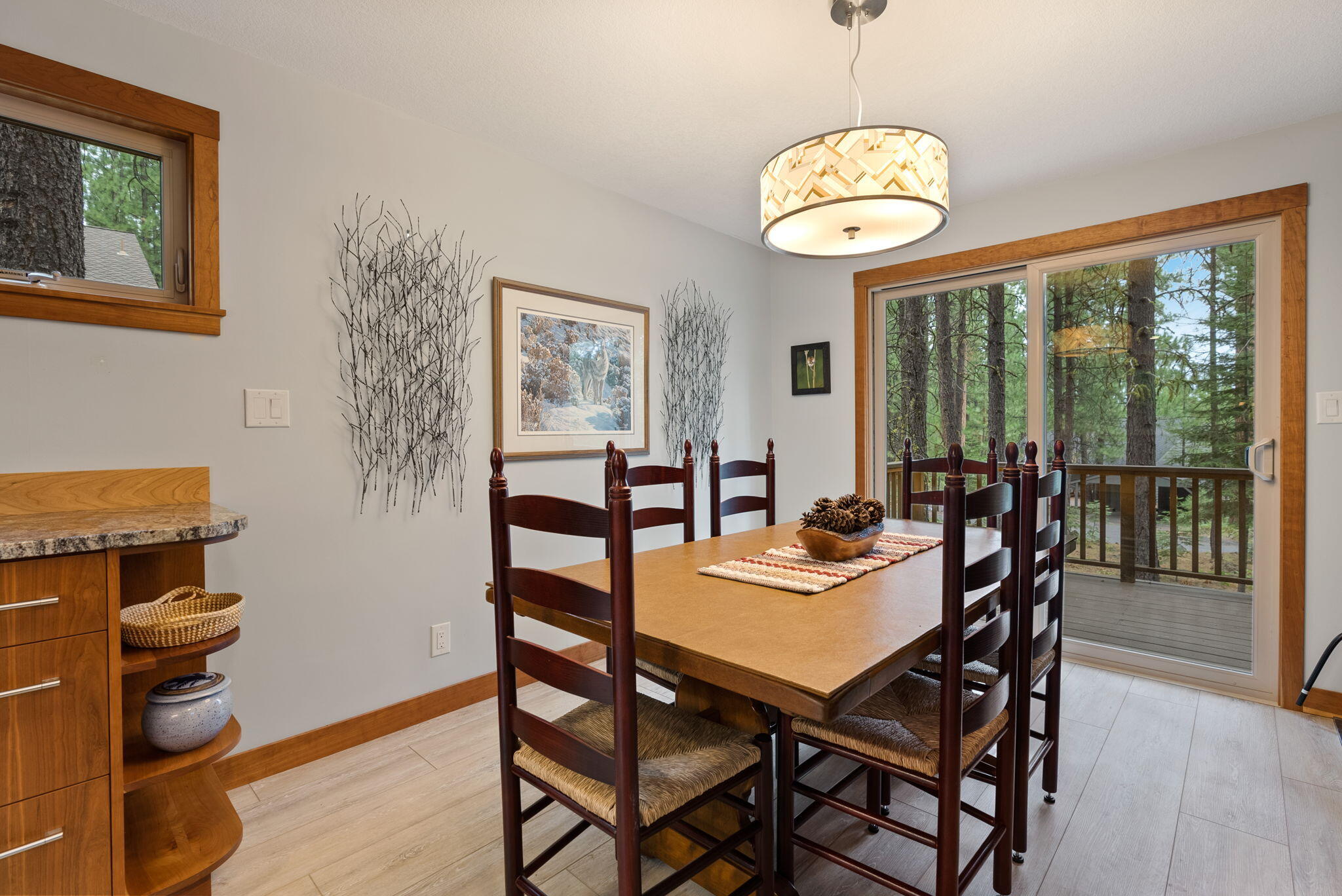 13251 Snowbrush, Unit GH 266 Black Butte Ranch, OR 97759 - Photo 10 of 37 a view of a dining room with furniture window and wooden floor