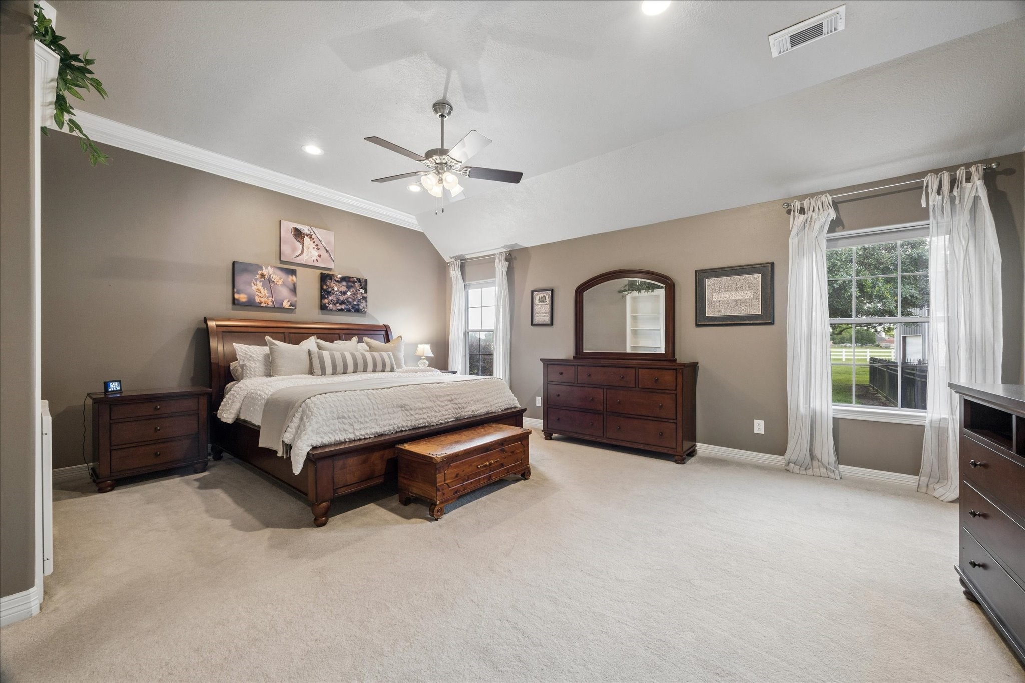 16519 Deerhaven Run Rosharon, TX 77583 - Photo 14 of 47 a spacious bedroom with a bed and a large window