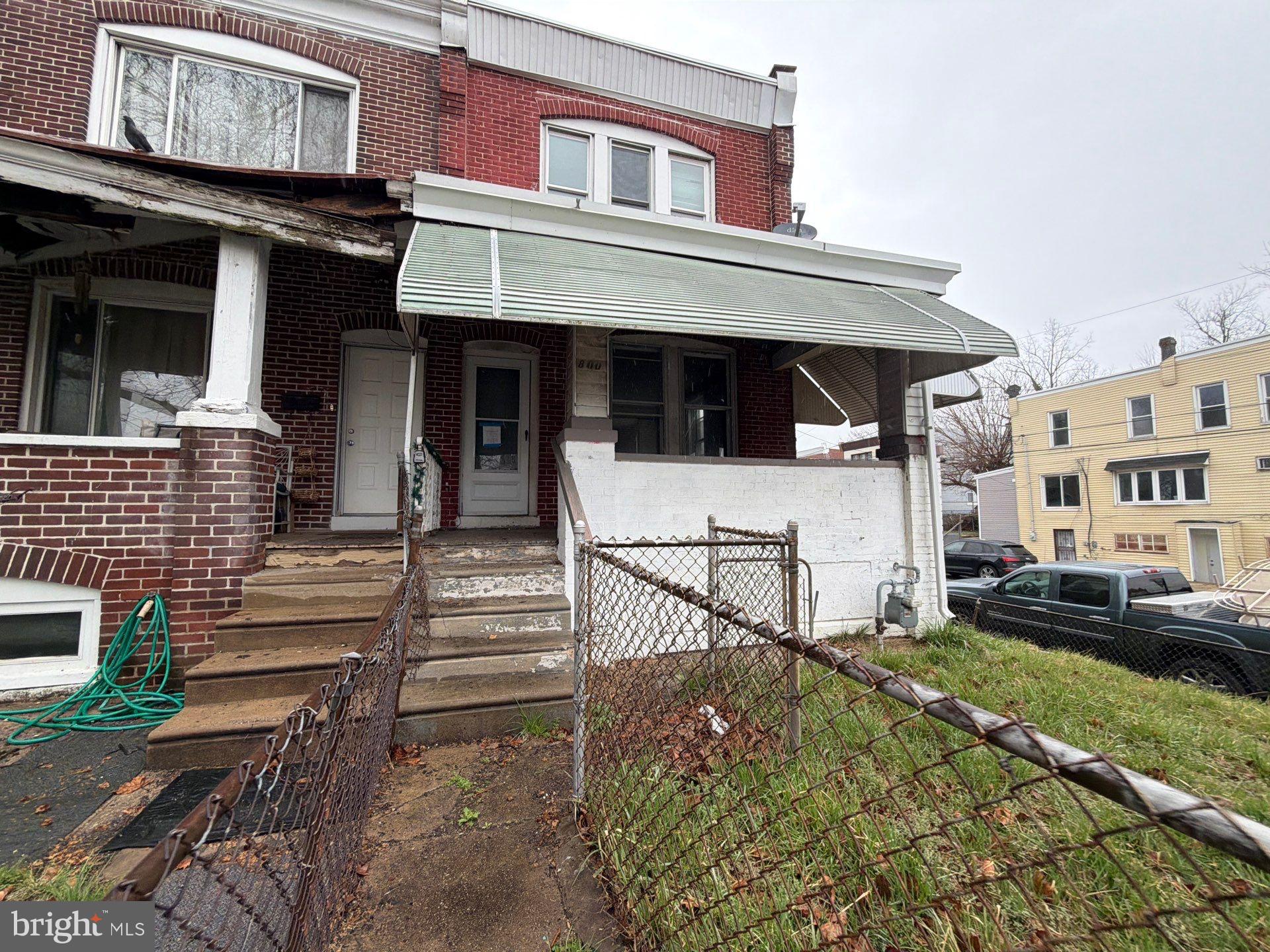 800 West 11th Street Chester, PA 19013 - Photo 1 of 17 a front view of a house with a yard