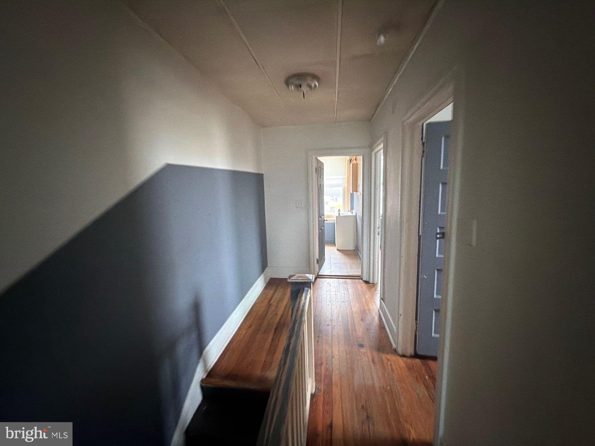 800 West 11th Street Chester, PA 19013 - Photo 12 of 17 a view of hallway with wooden floor