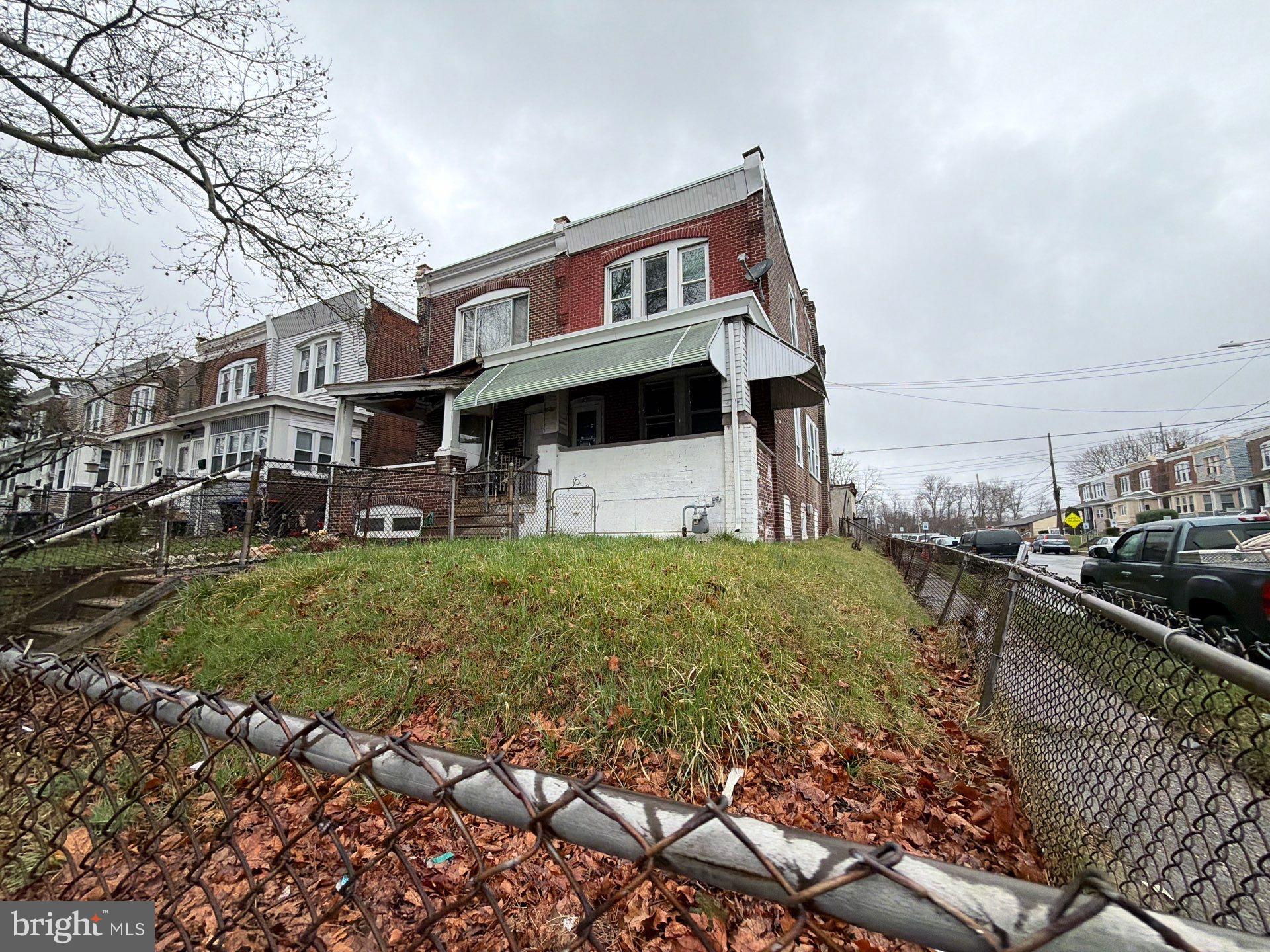 800 West 11th Street Chester, PA 19013 - Photo 16 of 17 a front view of a house with a yard