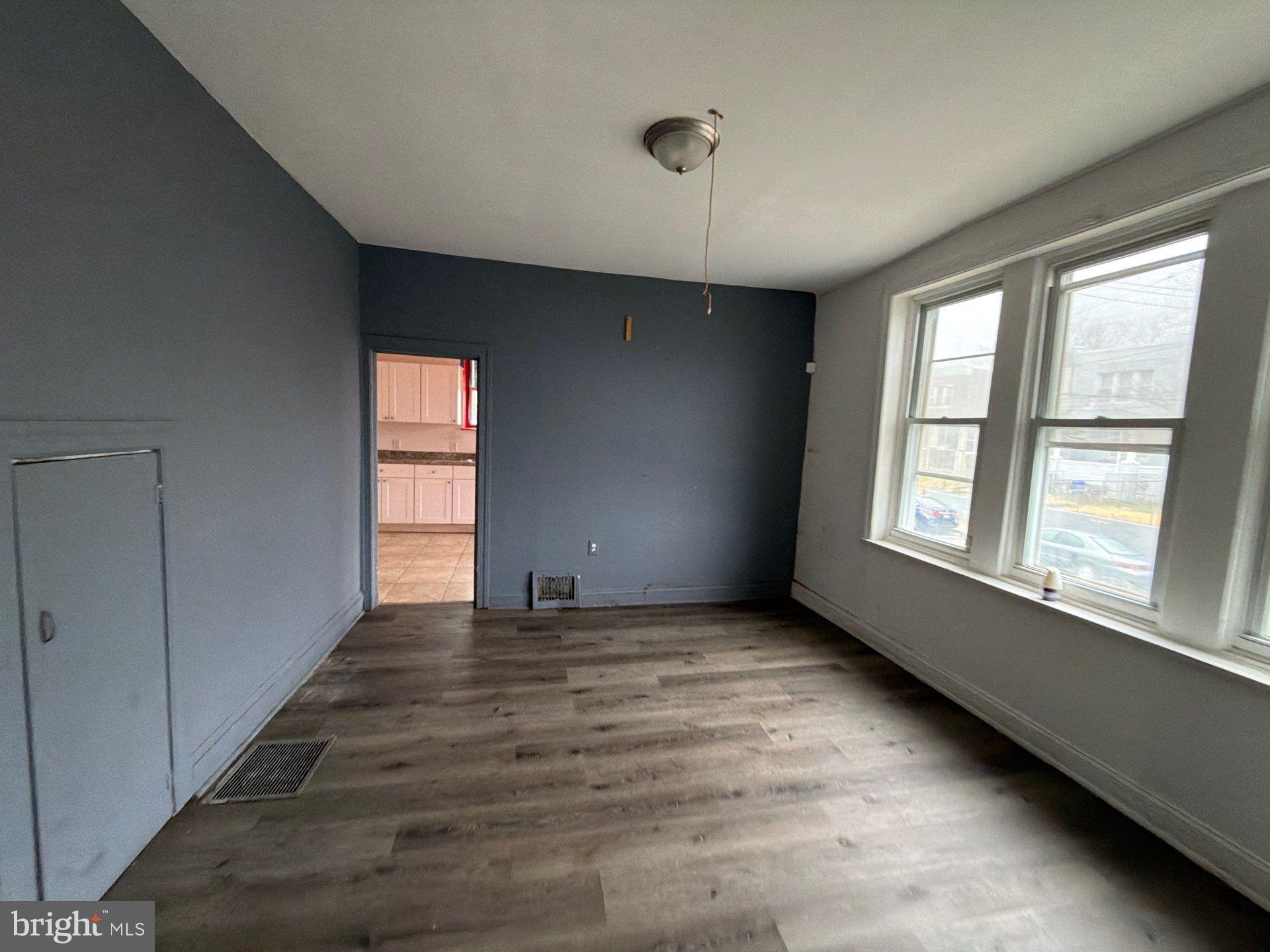 800 West 11th Street Chester, PA 19013 - Photo 2 of 17 a view of an empty room with a window