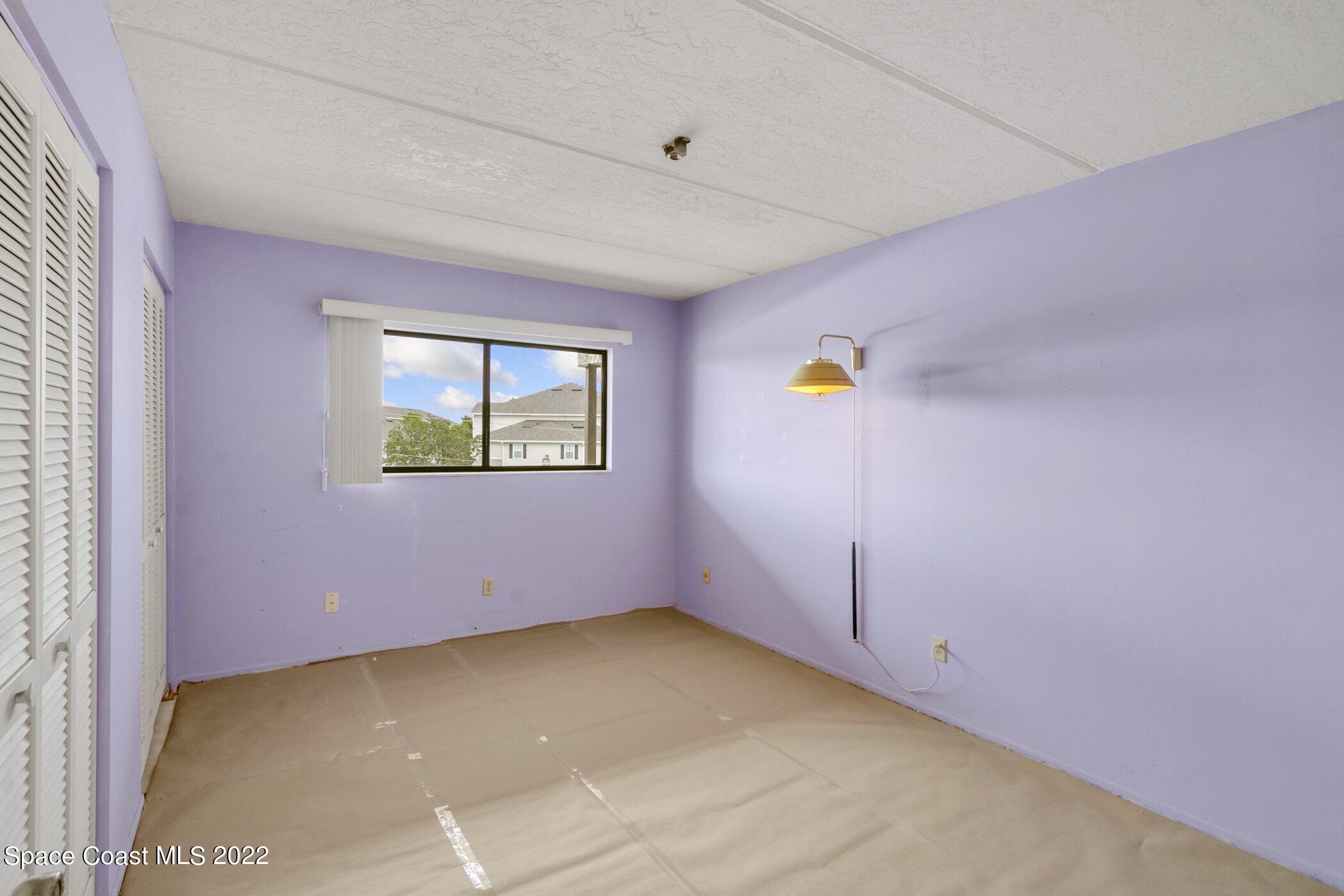 2775 North Wickham Road, Unit 302 Melbourne, FL 32935 - Photo 16 of 20 2nd Bedroom