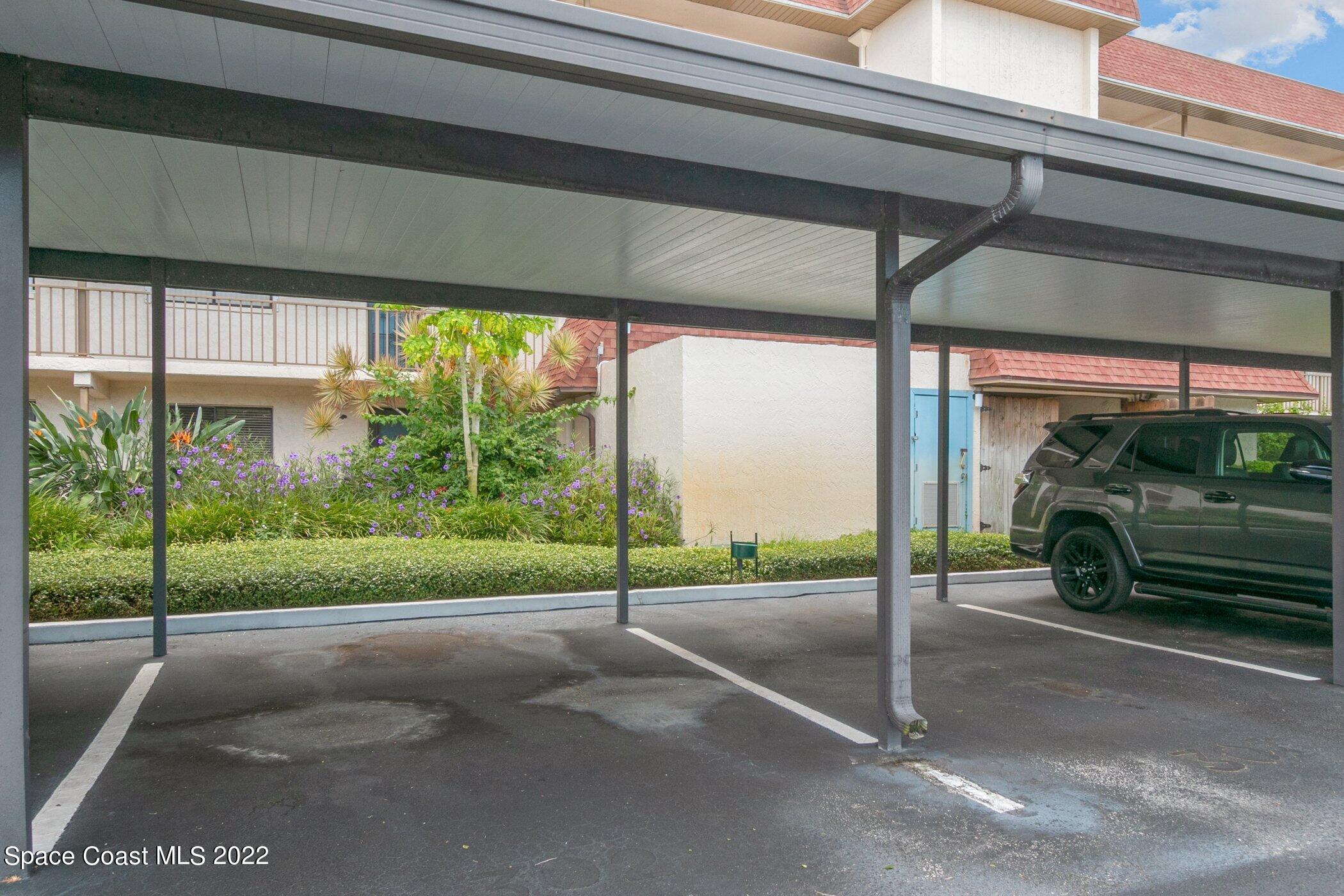 2775 North Wickham Road, Unit 302 Melbourne, FL 32935 - Photo 4 of 20 Carport