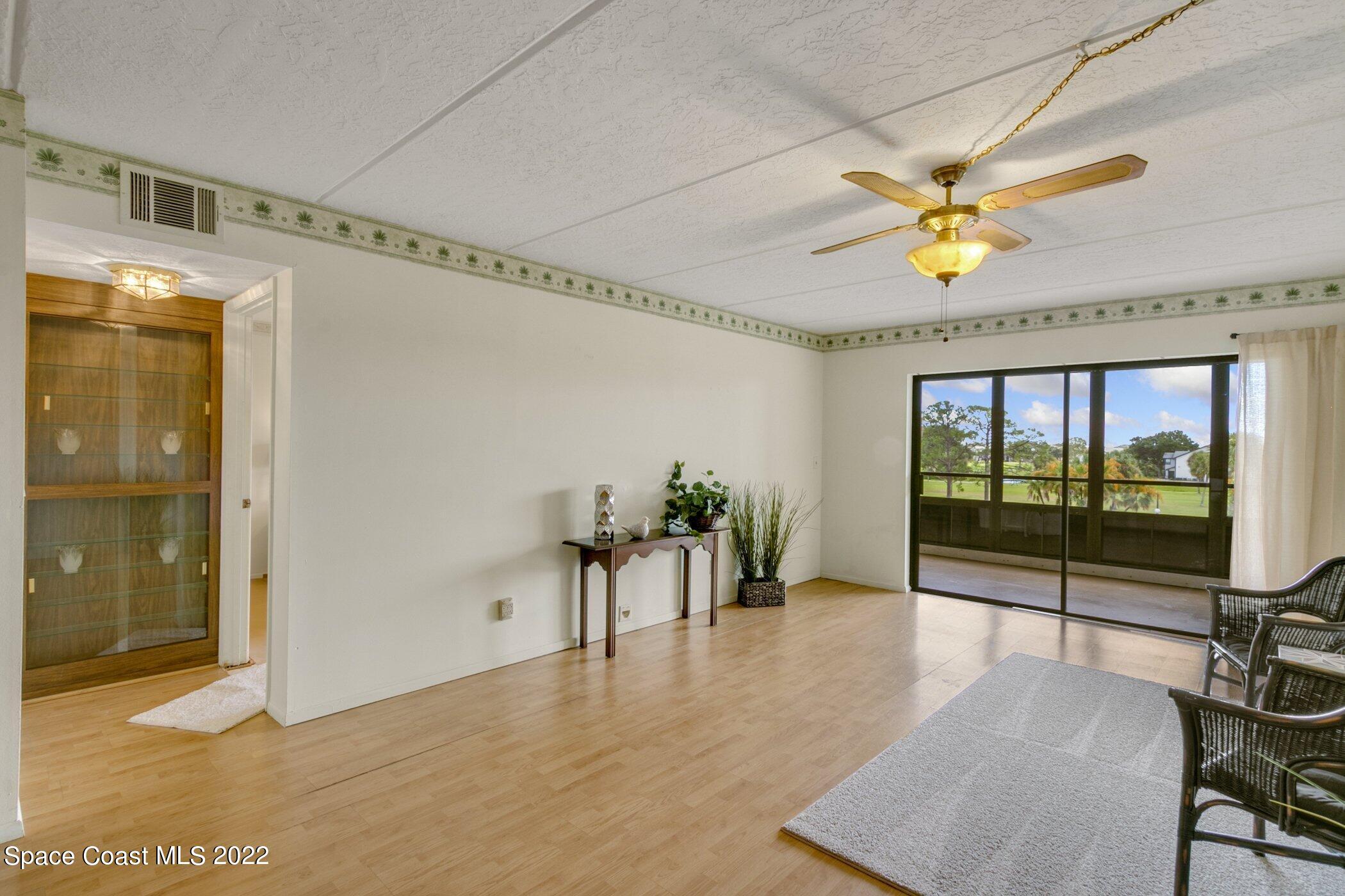 2775 North Wickham Road, Unit 302 Melbourne, FL 32935 - Photo 8 of 20 Living Room