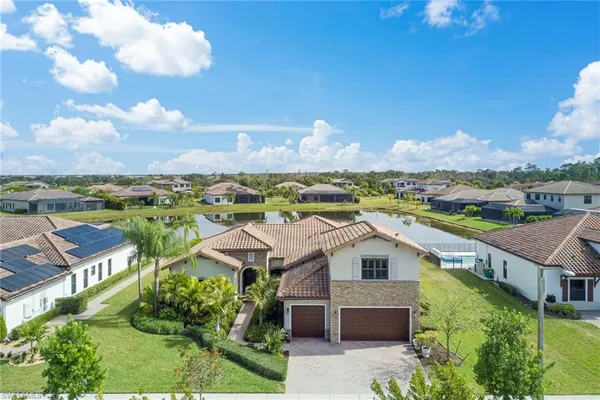 an aerial view of a house with a garden