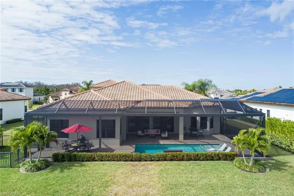 a view of yard with patio