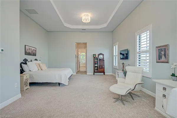 a bed room with a bed and a couch