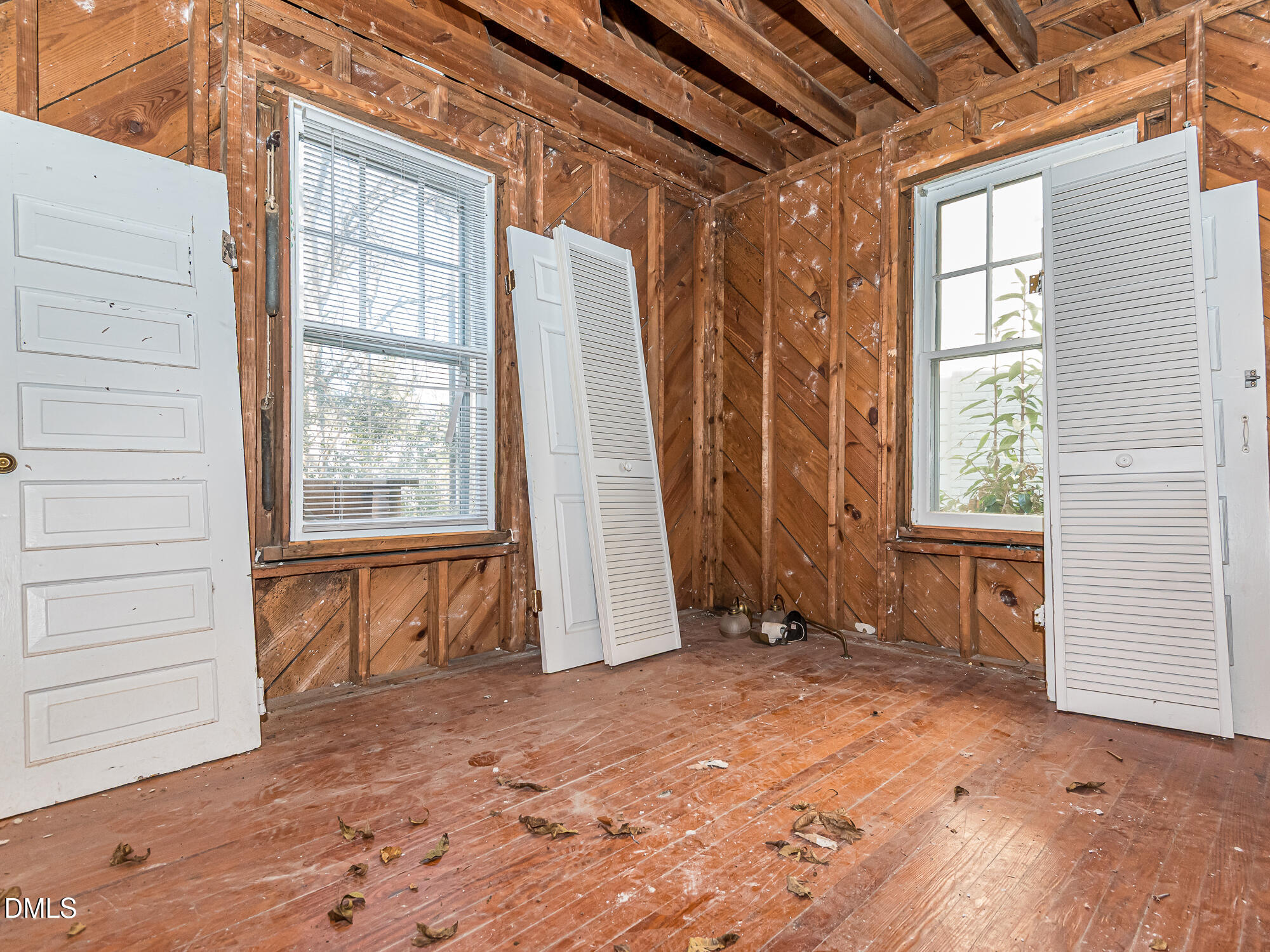 1825 White Oak Road Raleigh, NC 27608 - Photo 30 of 35 a view of an empty room with a window