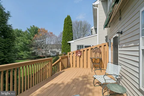 a view of a wooden roof deck