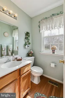 a dining room with furniture window and outside view