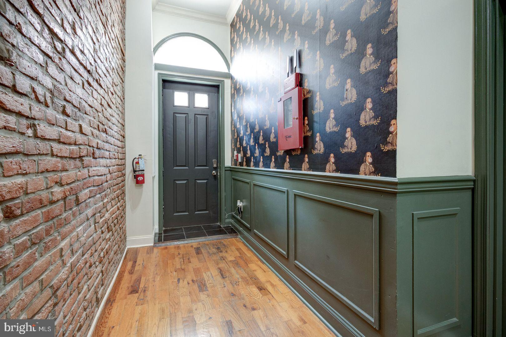 1723-0 Master Street, Unit D Philadelphia, PA 19121 - Photo 16 of 23 wooden floor with a mirror