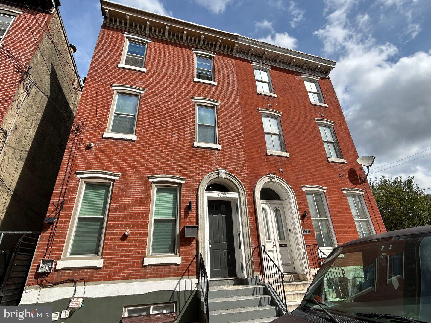 1723-0 Master Street, Unit D Philadelphia, PA 19121 - Photo 21 of 23 a front view of a multi story residential apartment building