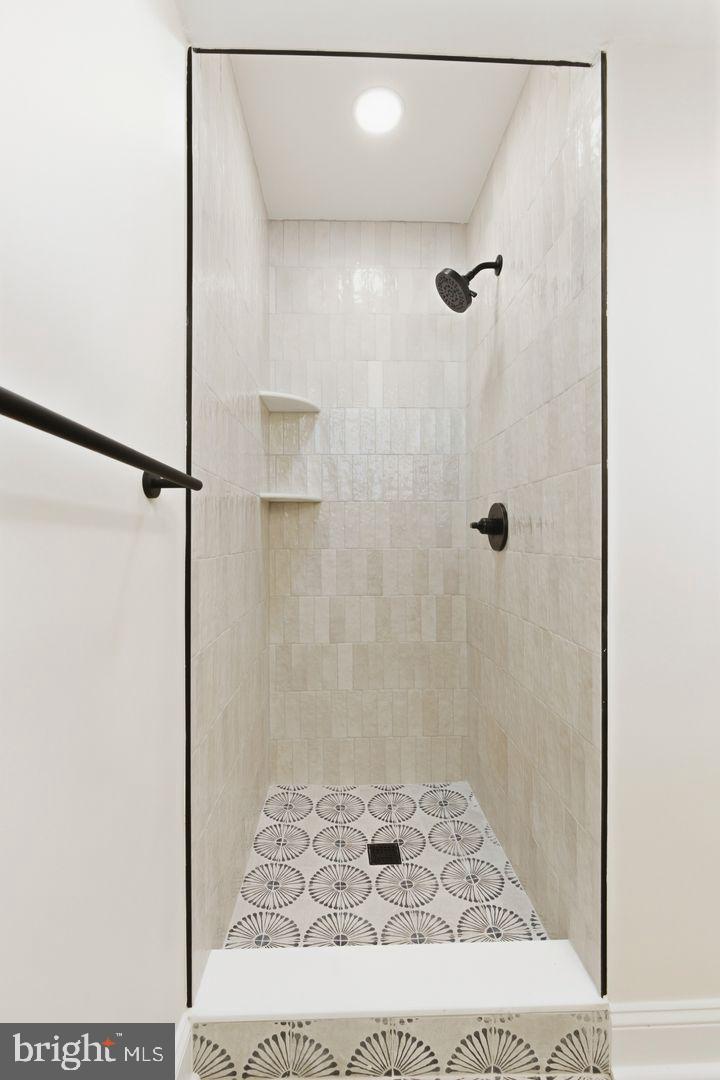 1723-0 Master Street, Unit D Philadelphia, PA 19121 - Photo 10 of 23 a bathroom with a shower and a sink